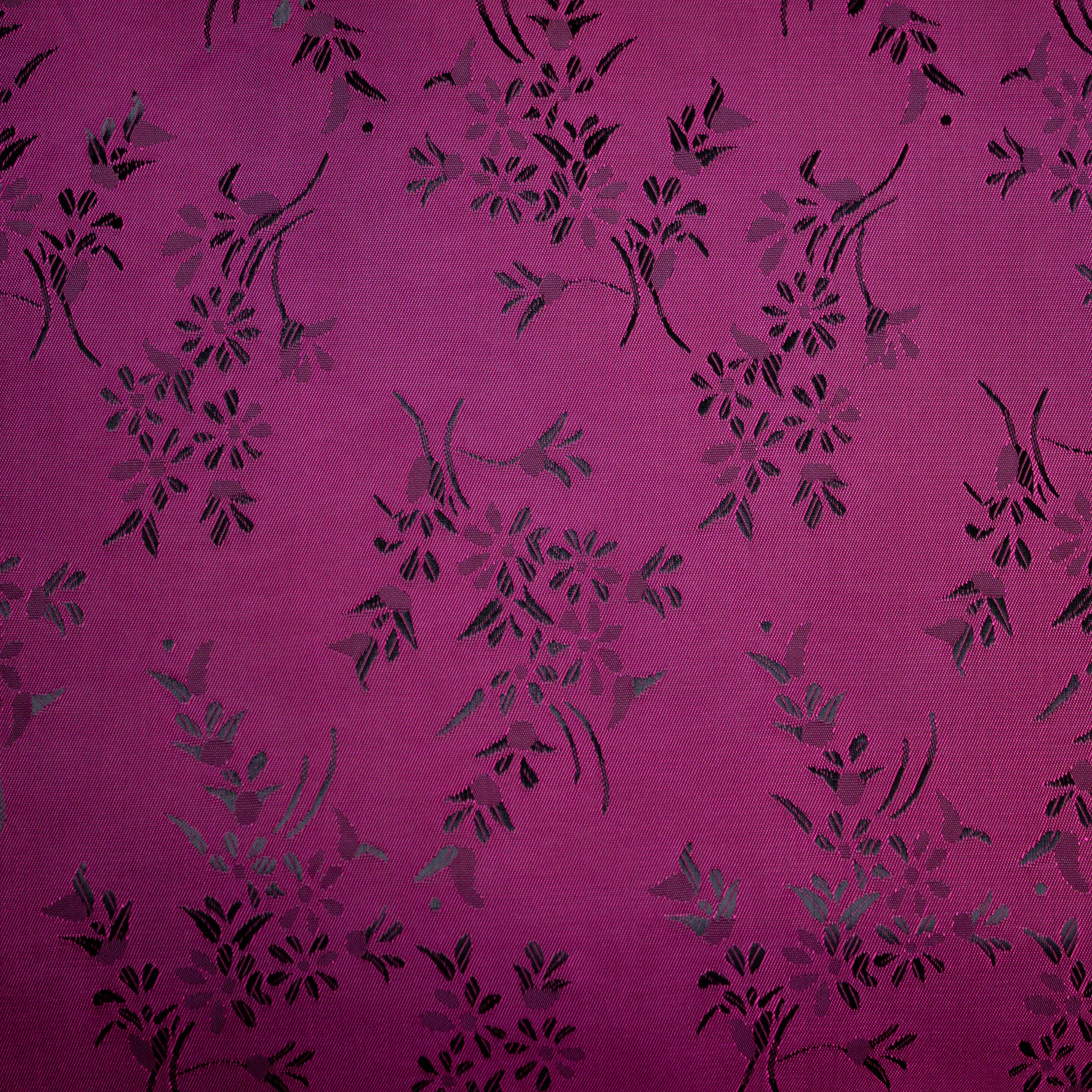 Fantasievoering double face fuchsia met sierlijk bloemen motief
